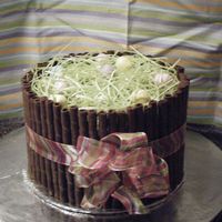 Easter Basket Chocolate Cake w/chocolate buttercreamGrass-candy grass from wal*mart doesn't taste great but looks cuteSide of Basket-Pirouette...