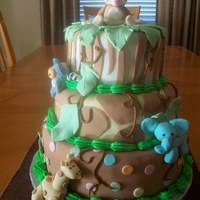 Monkey Baby Girl Of The Jungle Second time making this cake only that this one is the girly version. Used softer colors and a monkey on top instead of a lion to match the...