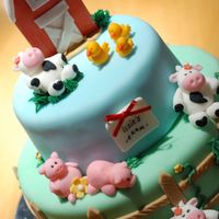 Old Mac Donald Had A Farm... My daughter loved the song so I made this cake for her 1st birthday. Everything was made out of fondant except for the barn.