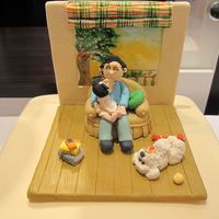 Time With Grandpa A cake I made for my dad's 60th birthday and it's my first people figures. Scene is in my dad's home with my daughter on his...