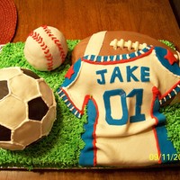 Have A Ball Sports theme 1st birthday designed to accompany jersey and ball shaped plates.
