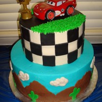Lightning Mcqueen Birthday I made this cake for my son's 3rd birthday. I didn't have a lot of time, and I'm not proud of sticking a giant plastic toy...