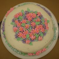 Final_Cake.jpg My Wilton class final cake. Yes, the black spots are crumbs. But, considering my cakes pans completely overflowed in the oven because I...