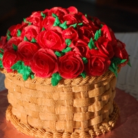 Basketful Of Roses I made this Valentine's cake for my aunt. It is made using the giant cupcake pan. It's all buttercream, including roses, leaves,...