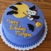 Morgan's Hello Kitty Witch Cake Cake I made for my daughters birthday, she requested a witch on her cake. Buttercream iced with fondant accents. Hello Kitty was cut out of...