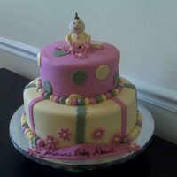 Baby Shower Cake Baby made out of gumpaste. Almond cake with guava filling. Covered in fondant.