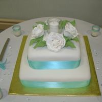 Square Wedding Cake Almond Cake with Almond Buttercream covered in fondant.