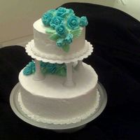 Cake.jpg Buttercream Wedding cake with Fondant Blue roses