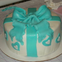 Wilton Course 3-- "the Bow" Lesson These are my wedding colors and I wanted to see what they would look like on cake...my fondant went a little wonky on me at the bottom......