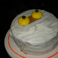 Mummy Cake This is from Wilton's website idea section. He was a spice cake with pumpkin cream cheese filling. Fondant wraps. I quickly covered...