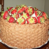 Basket Of Strawberries This is the Birthday Cake I made for my sisters 35th birthday. Yellow cake filled and frosted with choc. BC. Topped with choc. and white...