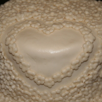 Love In Bloom Took me forever to get all these stupid flowers on there! It was my first time trying marshmallow fondant, and I didn't like the way...