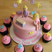 Erica's Gymnastics Cake Gymnastics theme cake and matching cupcakes. Gymnasts are fondant.
