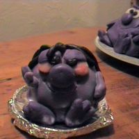 Hippie Monster First time ever using fondant. I made a bunch of monsters then used the leftover colors to make this one. Hard to see, but he is tye-died...