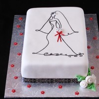 Bridal Shower This cake was designed to match the bridal shower invitations. The bride was hand drawn and I added fondant flowers for the bouquet to add...