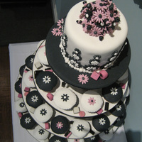 Wedding Cupcake Tower Black and white cupcake tower for a wedding cocktail party. Theme echos the couple's wedding invitations, which were a fun, modern...