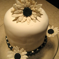 Black And White Daisy Cake Made this for New Years Eve dinner celebration. Gum paste flowers. Thanks for looking!