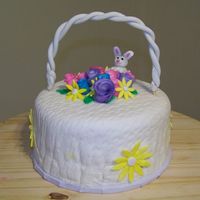 Easter/spring Birthday Cake WASC cake covered in BC & MMF for my grandma's birthday. First flowers, first time using my basket weave rolling pin & first...