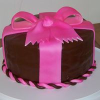 Pink Bow Cake WASC cake covered in BC & chocolate MMF. My first bow. The bow cracked a little, but I am real proud of this cake. I did use an flower...