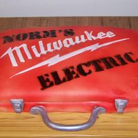 Norm's Electric Drill Box Made this cake for the shop by BF works at. They loved it! Made to look like a drill box cake w/the companies name stenciled on top....