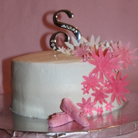 Ballet Recital Cake Vanilla butter poundcake with creamcheese butter cream and strawberry filling. gumpaste flowers.