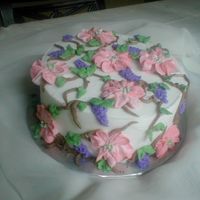 Buttercream Grapevine Trellis Cake This is a lemon butter cake with lemon curd filling. Flowers are suppose to be dogwoods with grapevines.. The dogwoods could of been a...