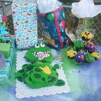 Dragon Birthday Cake yellow and chocolate cake with strawberry filling the outside is all buttercream