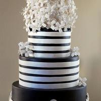 Black And White My birthday present for my best friend. I used Jennifer Dontz's semi homemade fondant and atleast 100 flowers from Cal Java. Bottom...