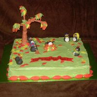 Penguin Cake Heidi has a great love for penguins. Because Heidis birthday is in the fall, the penguins are raking the leave for a fall setting.