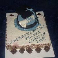 Graduation Red Velvet cake with butter cream and fondant cap and diploma