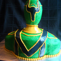 Green Power Ranger Totally got the idea for this cake from cc. Made for my 4 yr old nephew who loves power rangers. Head and neck are rkt. Everything covered...