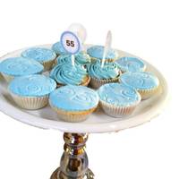 Blue Cupcakes For 55Th Birthday blue cupcakes for a 55th birthday. Some covered in fonant embossed with 55 and some with buttercream and paper toppers