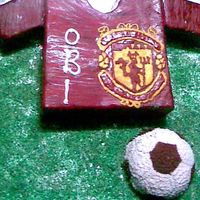 Man U Jersey i made this cake for my hussy's birthday. he is a fan of man u