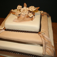 First Square Cake Square cake with fondant and gumpaste roses.