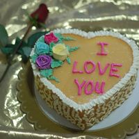 Sweetheart Caramel Cake Light chiffon cake covered with not so sweet caramel, designed with butter roses.