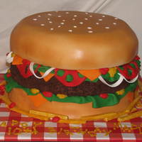 Cheeseburger Everything was made with fondant. The burger was iced in chocolate frosting then covered with chocolate cake crumbs.