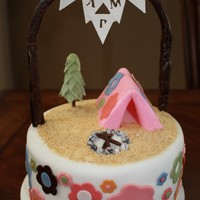 Campout Cake 8" round campsite cake. Design matches scrapbooking paper that was used in invitations. Gumpaste wooded arch with marshmallows,...