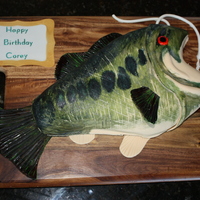 Bass Fish Cake Chocolate cake with choc mousse. Covered in fondant with gumpaste fins. Painted with Wilton's gel colors and PME Edible Lustre Spray...
