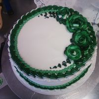 Green Rose Simple cake with green borders and roses.
