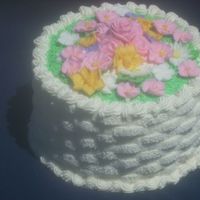 Wilton Course 2 Final Cake B/C basketweave, RI flowers: roses, pansies, daisies (those are fondant, just threw 'em on), apple blossoms, primroses, daffodils....