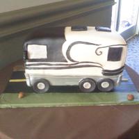 Groom Tour fondant with pearl airbrush spray. Groom drives busses for celebrities (music, ect) Bride surprised groom with cake of a comedian's...