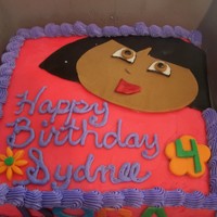 Dora Birthday Cake Butter cream icing with Dora in fondant. Dora letters are also fondant. Thanks for looking, have a great one!