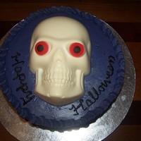Skull Cake All buttercream except for skull, it's a Wilton ice mold I found. Instead of ice, I used candy melts. On the side of the cake there...