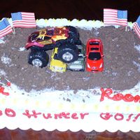 Monster Truck Buttercream icing and I used chocolate grahams to make the dirt...