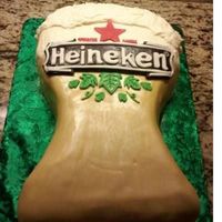 Heineken Beer Glass This is a French Vanilla Cake with Strawberries & Cream filling. BC Frosting. The Beer is fondant painted with pearl dust to give it a...