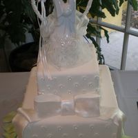 Square Wedding Cake Again, in my opinion: Religious ceremony = white, + light mint accents.