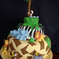 Safari Baby Shower Cake This cake was inspired on one that I found online but made a few changes to it that I did not like much. Like my animals, these are made...
