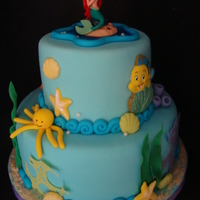 Ariel/ Little Mermaid 2 Tier Cake 2 tier cake all covered and detailed in fondant