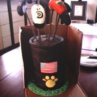 Golf Bag I tried to replicate my fiance's golf bag and clubs for his birthday cake. The clubs are fondant with dowels painted and pushed...