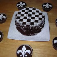Checkerboard And Fleur I took a 9 inch cake recipe and made a few cupcakes first before baking a 6 inch cake. It's Brooklyn Blackout cake with a powdered...